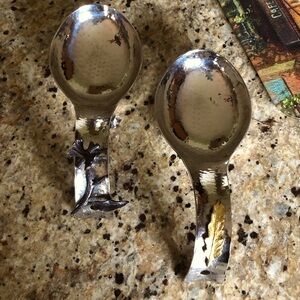 Two Hammered Metal Spoon Rests